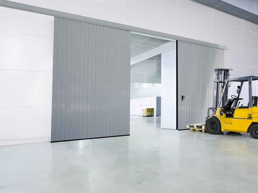 WISNIOWSKI Раздвижная дверь Portoni sezionali industriali sun-id-1461936 - Вид №1