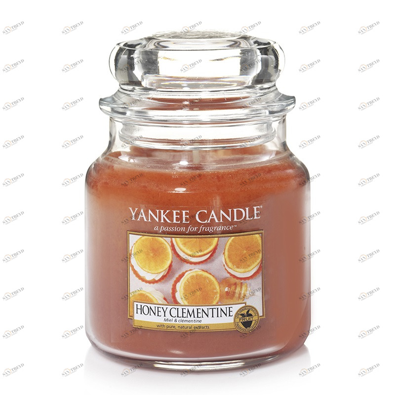 Свеча средняя в стеклянной банке "Медовый клементин" Honey Clementine 411 гр 65-90 часов YANKEE CANDLE  267988 Оранжевый 