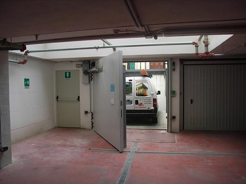 CARMEC Моторизованная противопожарная дверь гаража Portoni e cancelli sun-id-1371448 - Вид №1