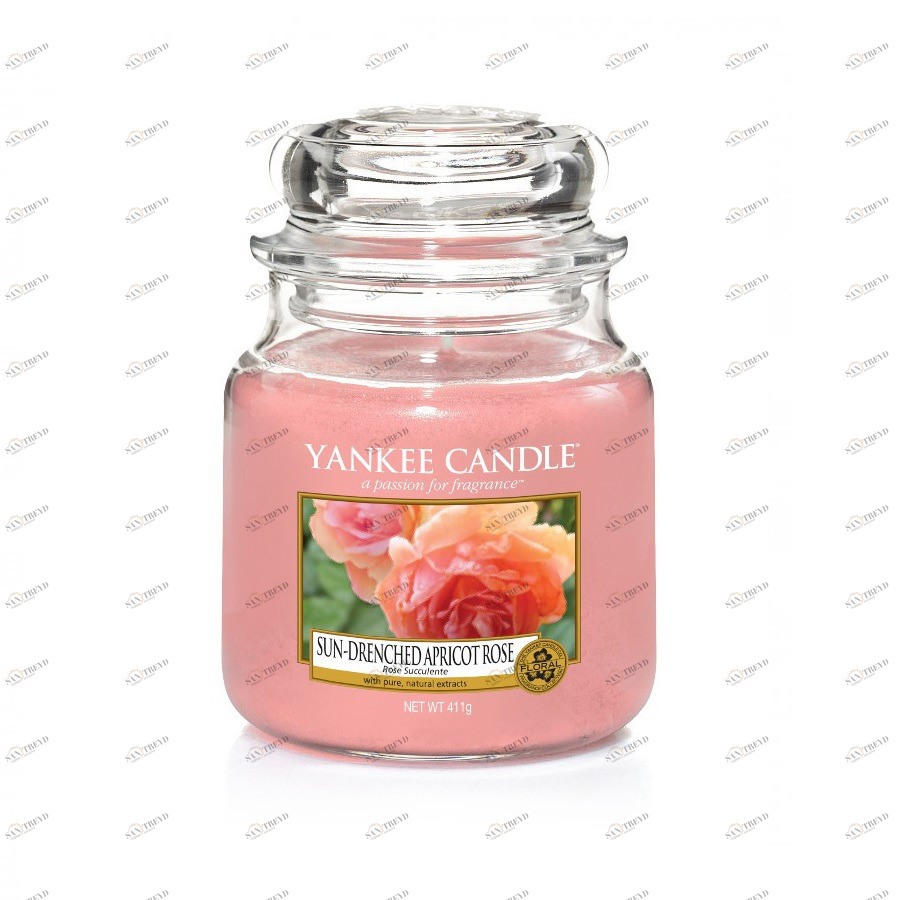 Свеча средняя в стеклянной банке "Солнечная абрикосовая роза" Sun-drenched apricot rose 411 гр 65-90 YANKEE CANDLE  268015 Розовый 