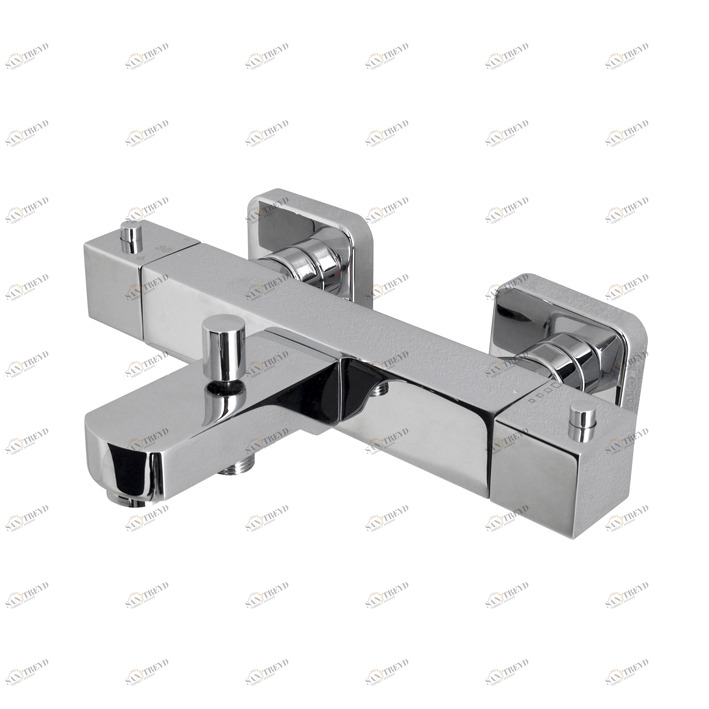 Настенный термостатический смеситель для ванны внешнего монтажа с восковым термостатическим элементом, соединениями 1/2 дюйма, запорным переключающим клапаном и плюсовым аэратором. Встроенный обратный клапан. Остановка безопасности при 38ºC. Межосевое рас Noken 100100598